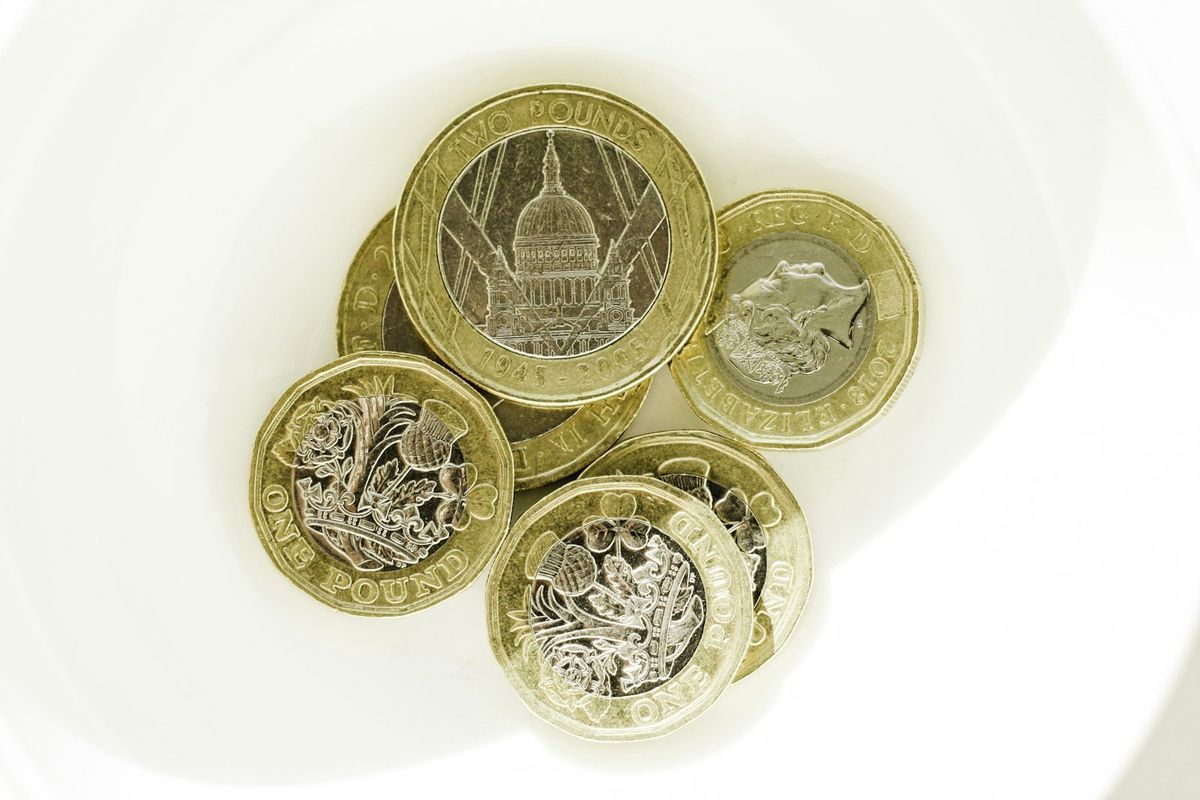 Tackling debt in 2026 - British pound coins representing UK debt management