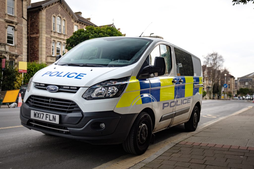 police van parked on street in the uK