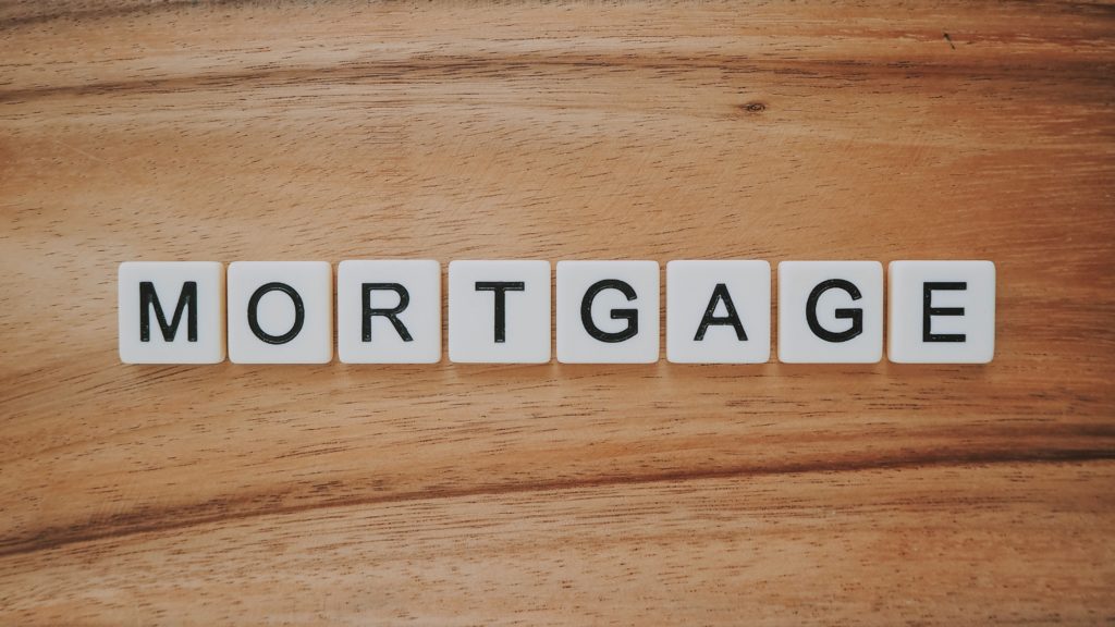 letter tiles spelling out mortgage